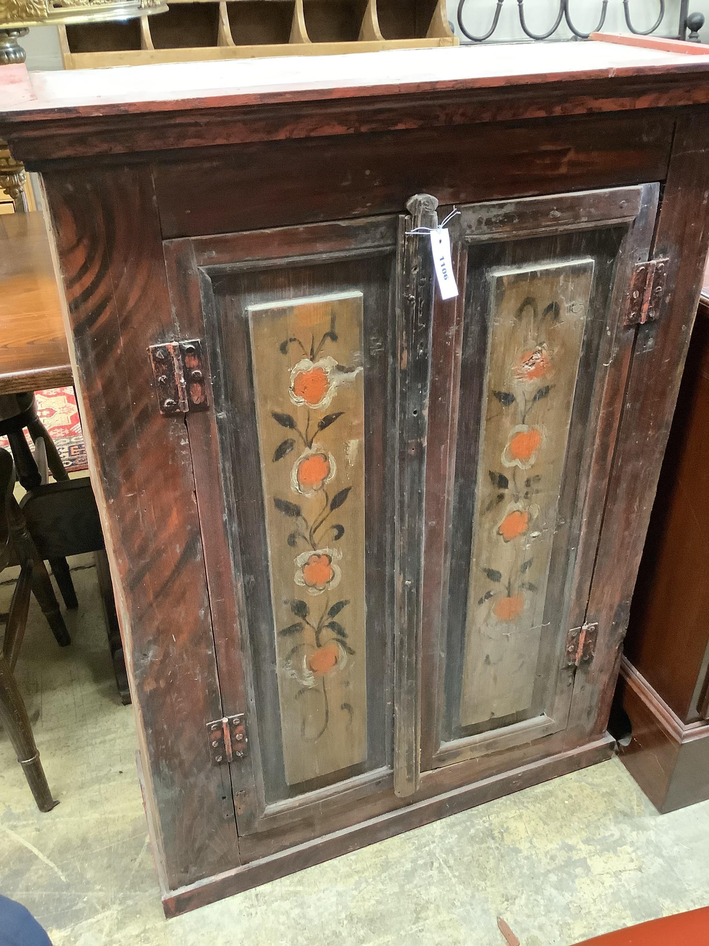 A 19th century Russian painted two door hanging cupboard, width 82cm, depth 31cm, height 110cm